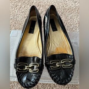 Coach Black Flats with Gold Chain Detail